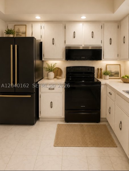 Condo for sale at Olympus Towers 1015