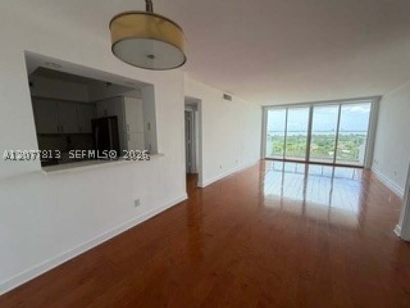 5600 Collins Apt #15J