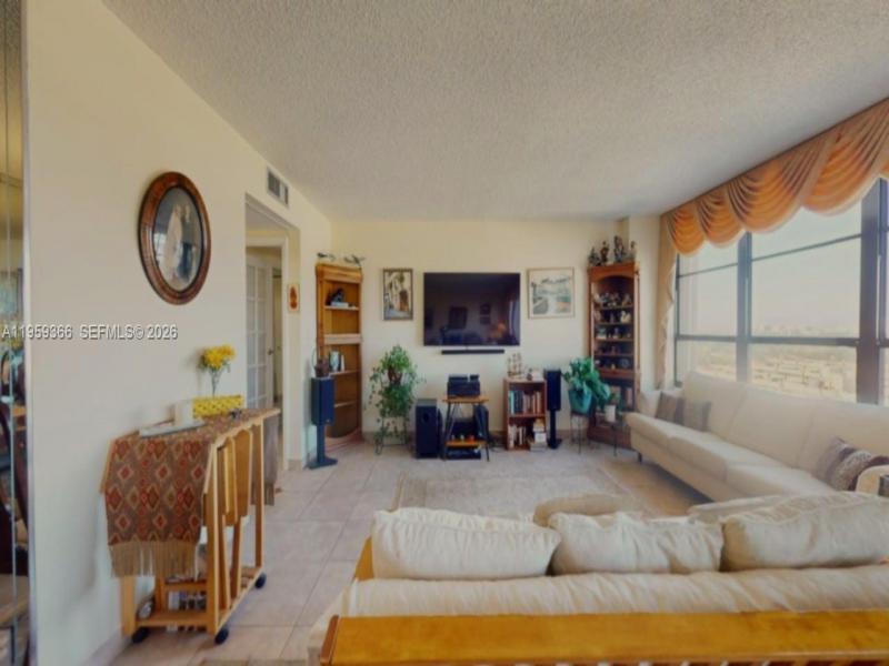 Condo for sale at Olympus Towers 1004