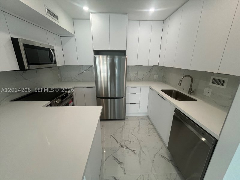 Condo for sale at Alexander Towers 210