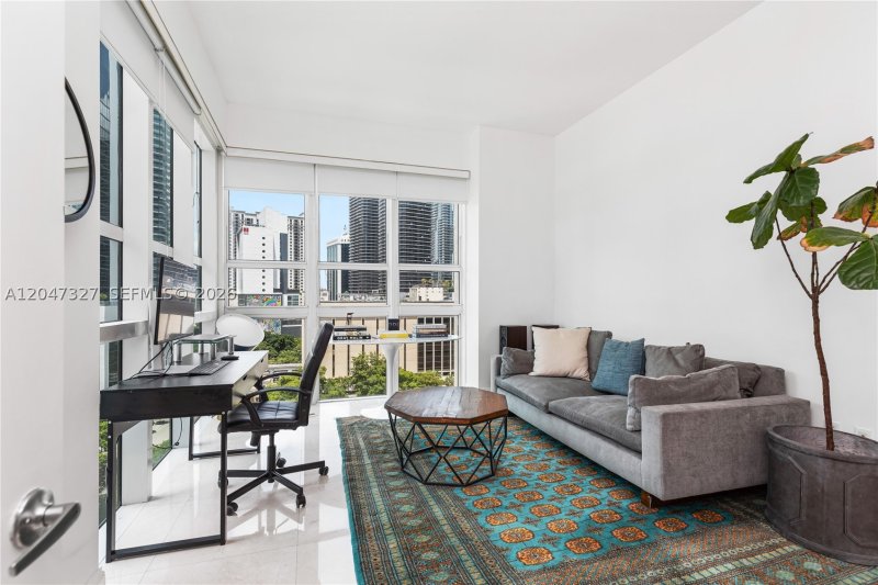 Condo for sale at The Plaza Tower II 1011